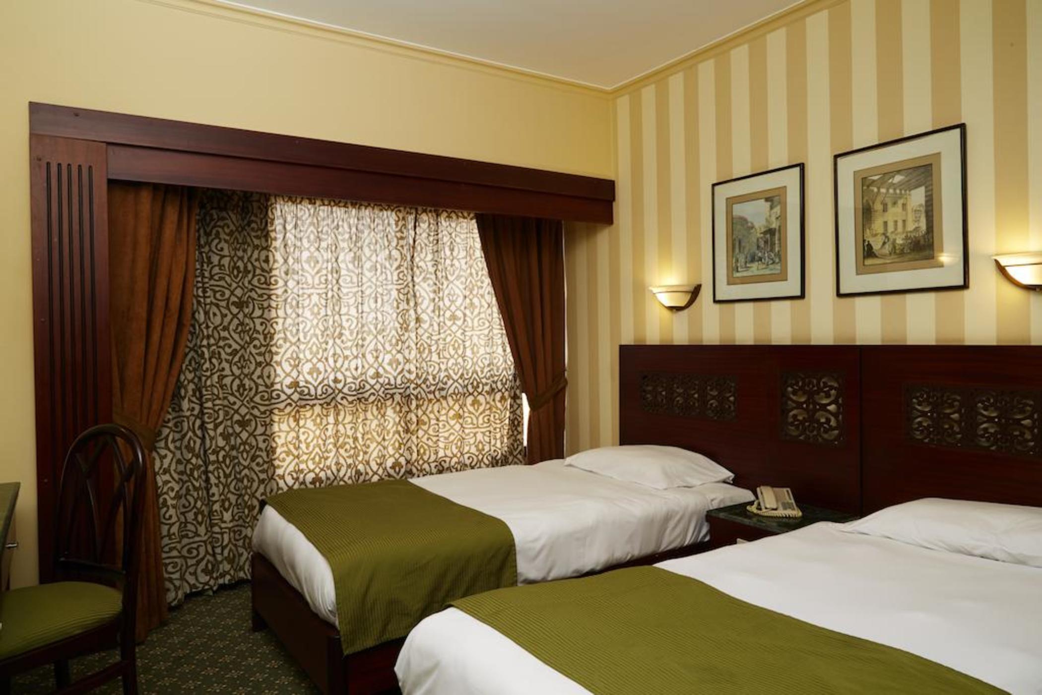 Pyramisa Suites Hotel Cairo Giza Luaran gambar A room at the hotel